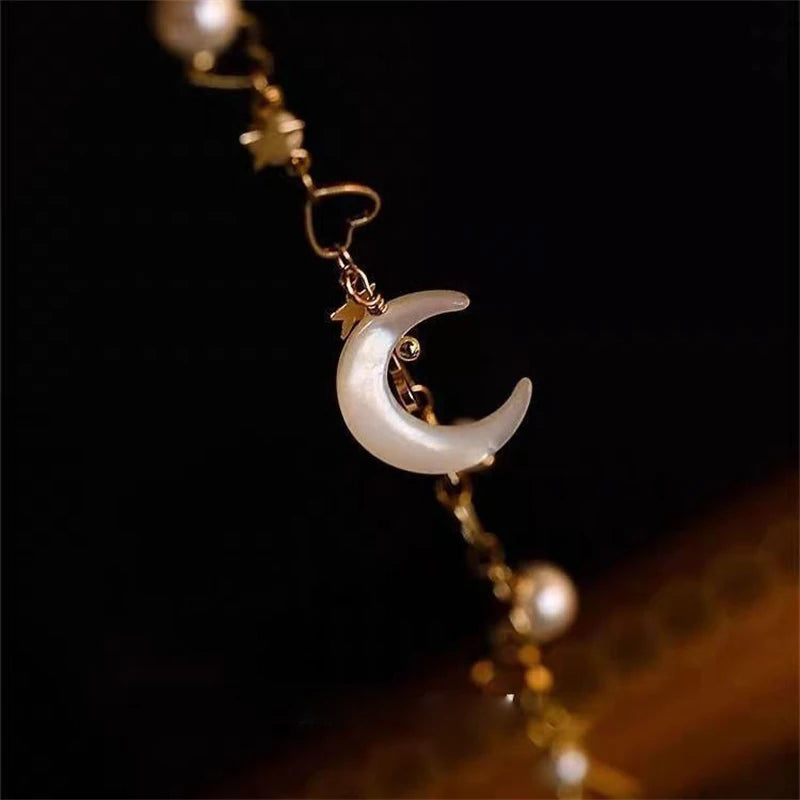 Pulseira de Pérola da Lua Coreana Romântica para Mulheres, Elegante e Exquisita, com Encanto de Estrela e Coração, Braceletes de Cadeia para o Natal.